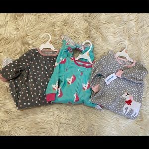 3 Carter’s girls footed sleepers size 12mo $60